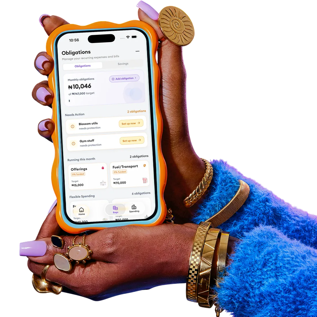 Hands holding a phone running Balancc’s Obligations screen — monthly obligations, targets, and spending categories